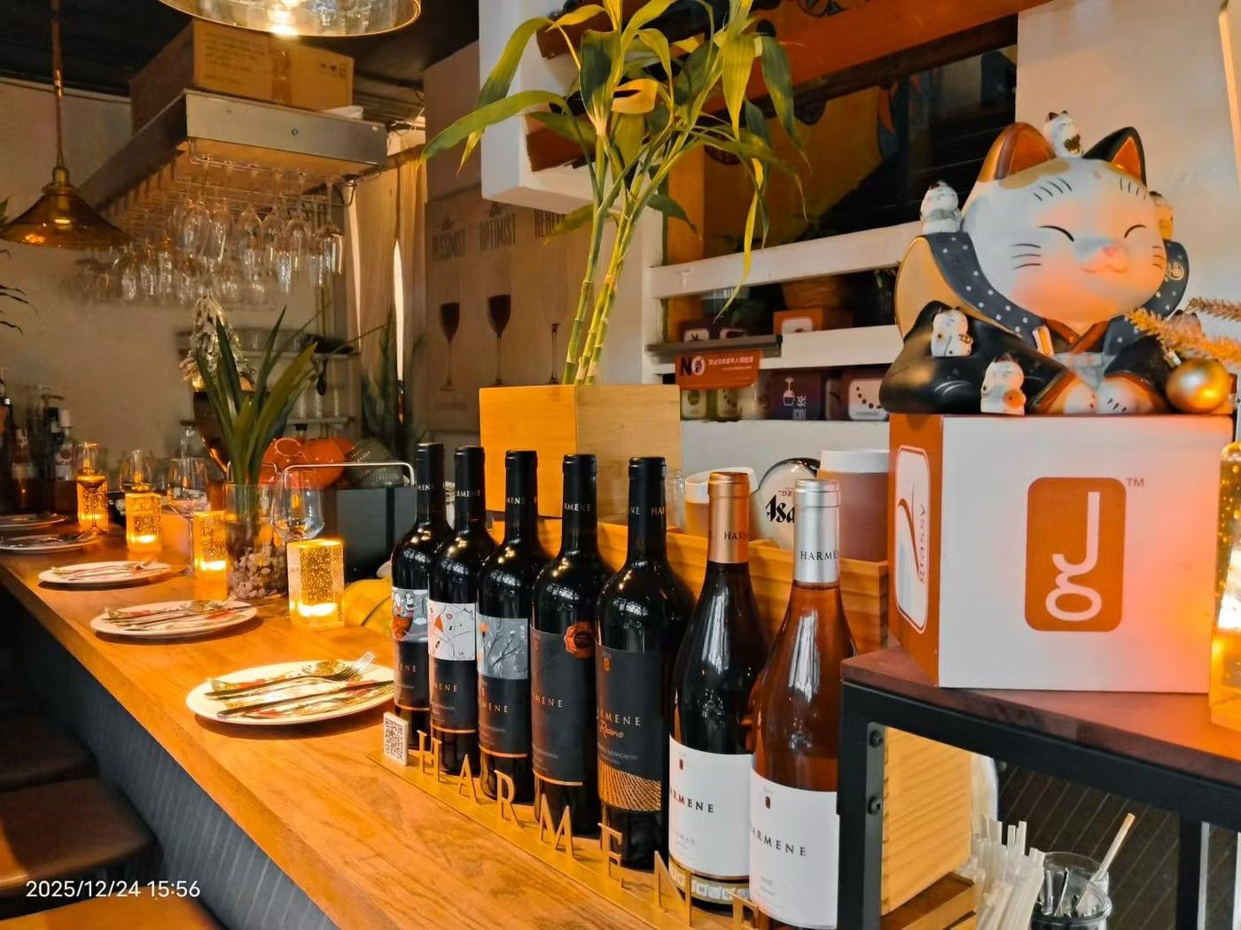 Wine bottles along the bar at Justgrapes