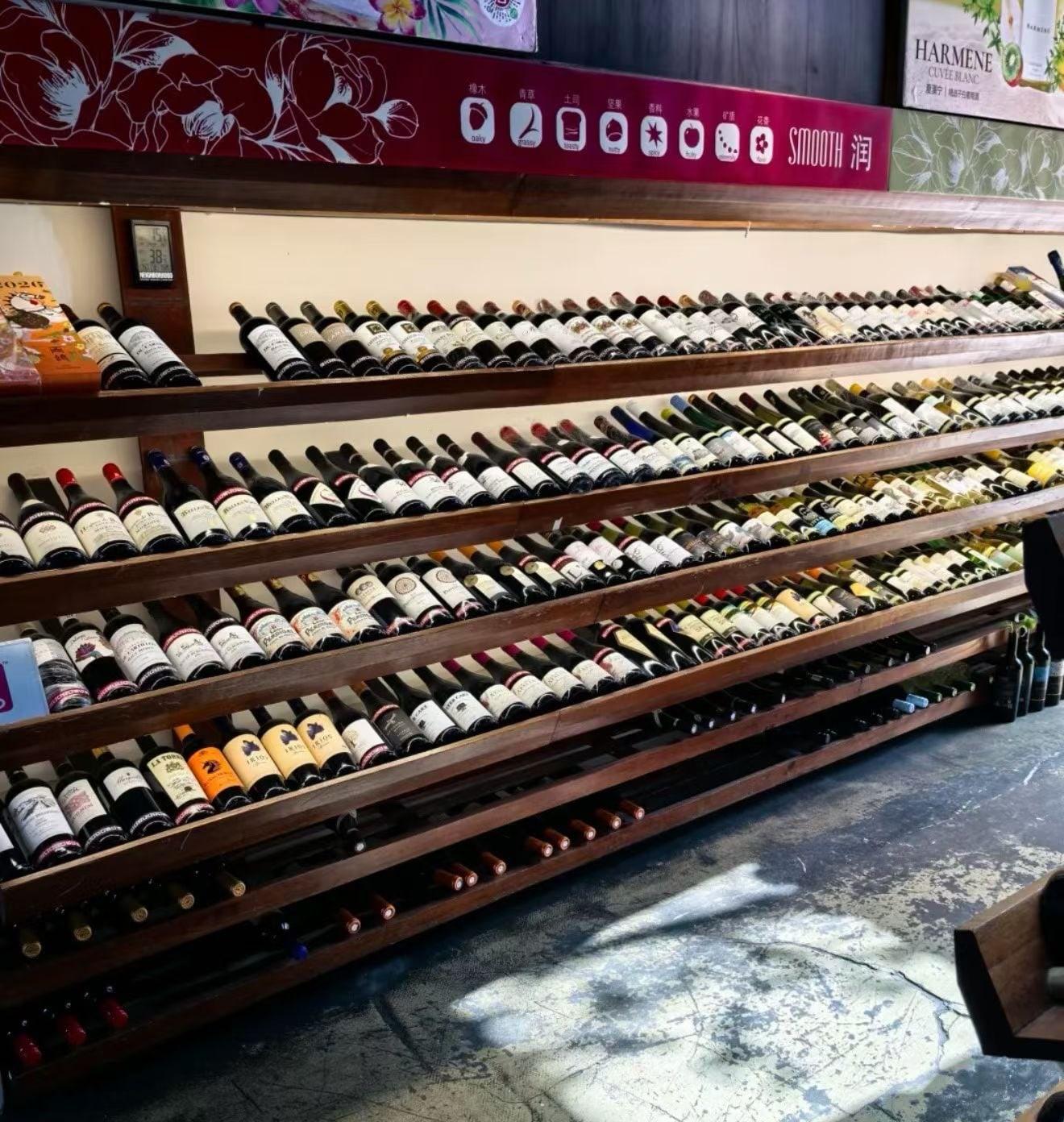 Wine shelves under the Smooth banner at Justgrapes